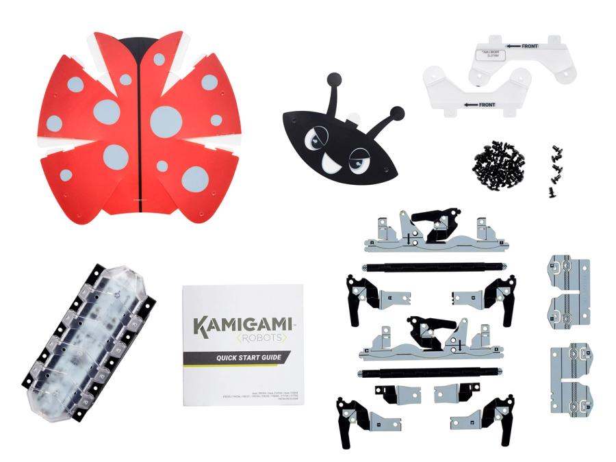 All of the pieces that go into making the ladybug kamigami.