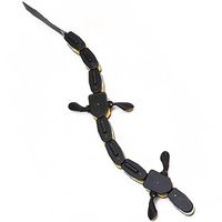 A black salamander shaped robot with four flipper feet and a segmented body with a tail.