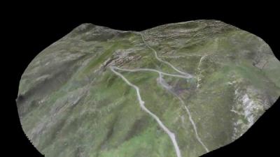 A senseFly drone maps a mountainous field.