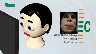 Virtual Flobi imitates your facial expressions.