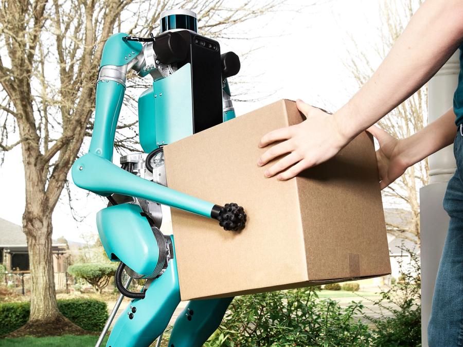 A blue-green humanoid robot hands a package to a human.