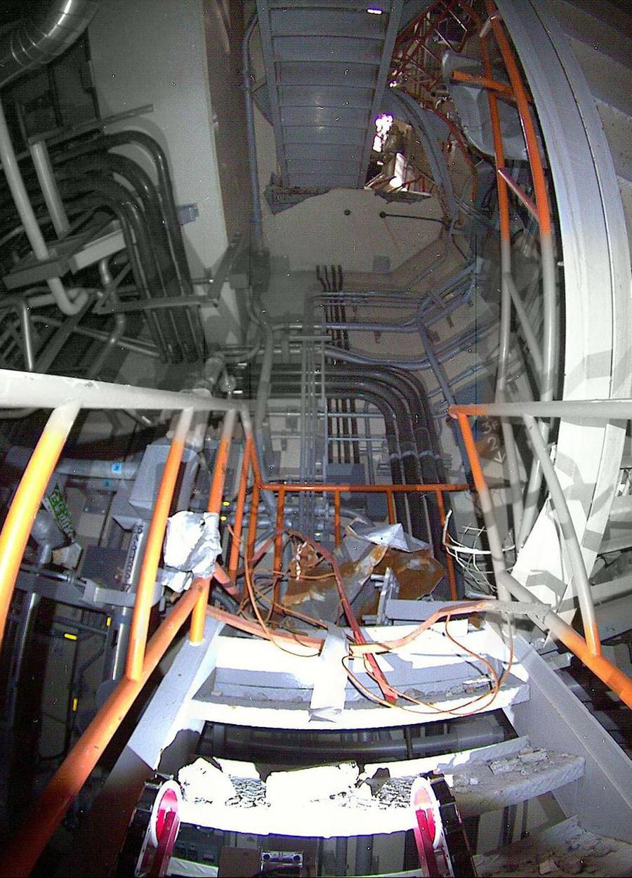 The robots base is seen in a camera view from Quince showing the inside of a reactor building.