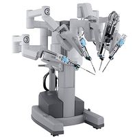 A robotic system including four arms with surgical tools.