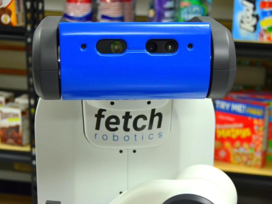 Close up of the robot's blue rectangular head showing it's camera sensor eyes.