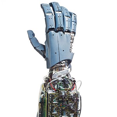 A human-like robotic hand with five jointed fingers in blue casing attached to an electronics laden forearm.