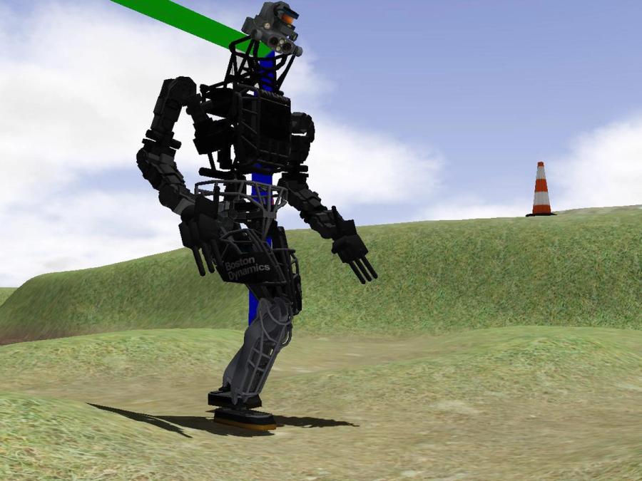 Computer image of a black humanoid robot on a hilly green space.