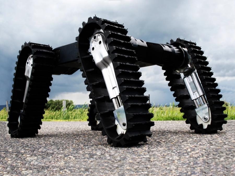 A robot consisting of four connected robotic appendages with tracks on them.