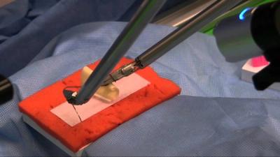 Suturing with the Raven surgical system.