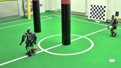 Robots practice passing.