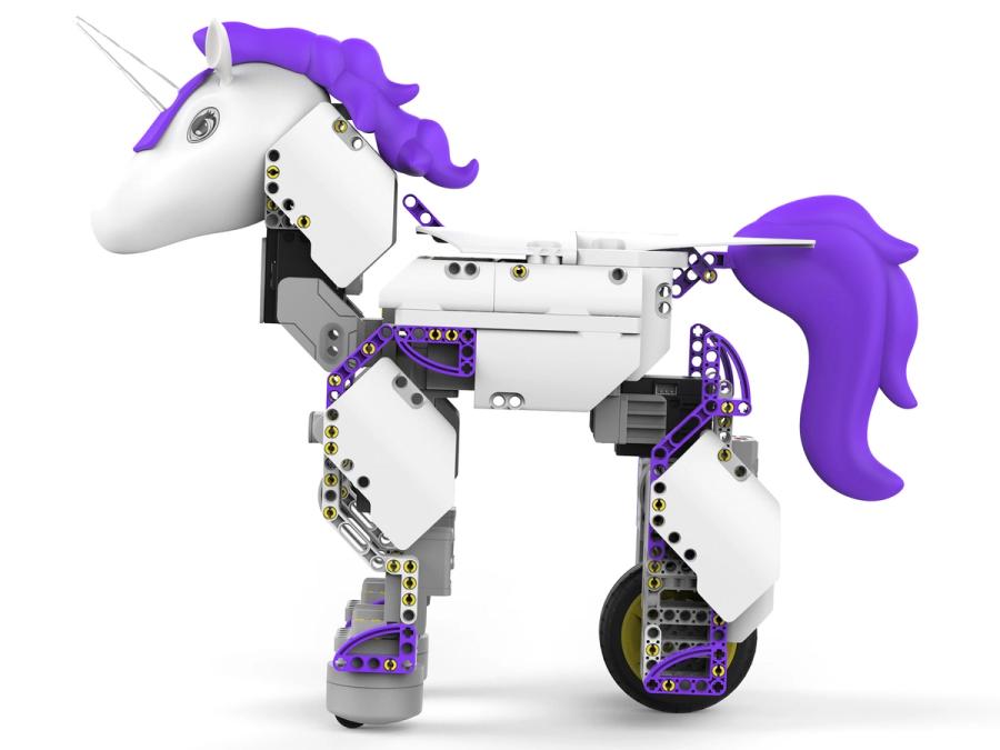 Side view of a purple and white unicorn with a white horn and wheels, made up of many small, simple plastic parts.