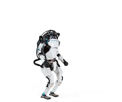 An advanced humanoid balances on its two feet, jumps up, and lands on both feet.
