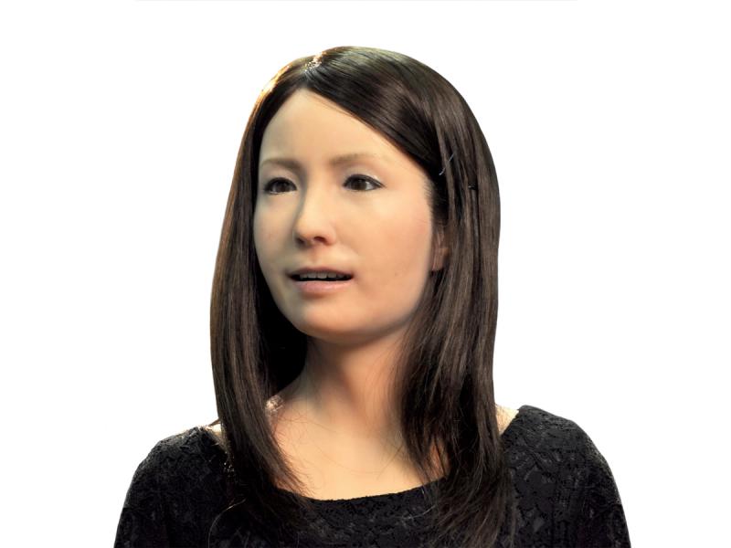 A female robot with a realistically human appearance of a young Japanese woman.