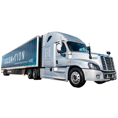 A silver freight truck that says Locomation on it.