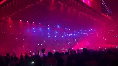 Drones and Drake on stage.