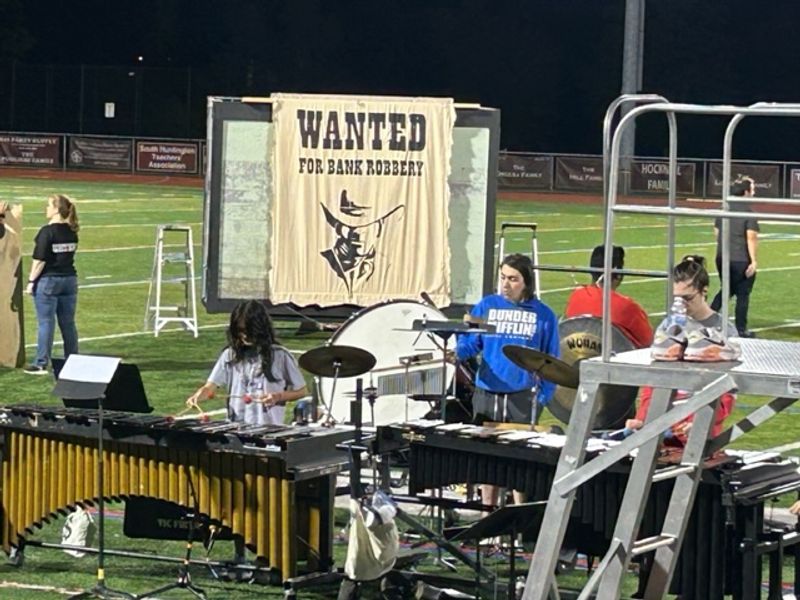Marching Band practicing their 2023 show, "Wanted."