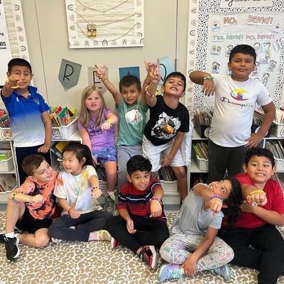 Ms. Pawlowski’s class made friendship bracelets after reading the book Our Class is a Family.