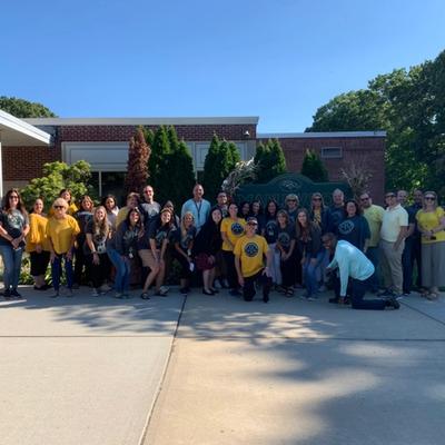 staff wear gold for Maggie's Mission