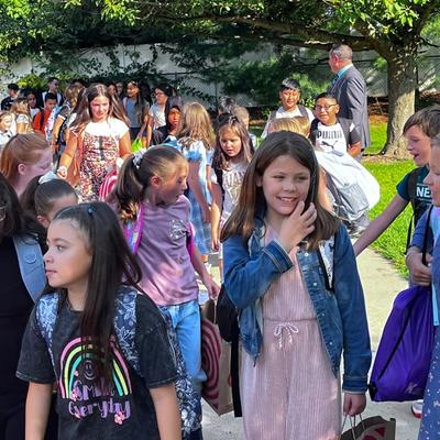 students arriving from buses