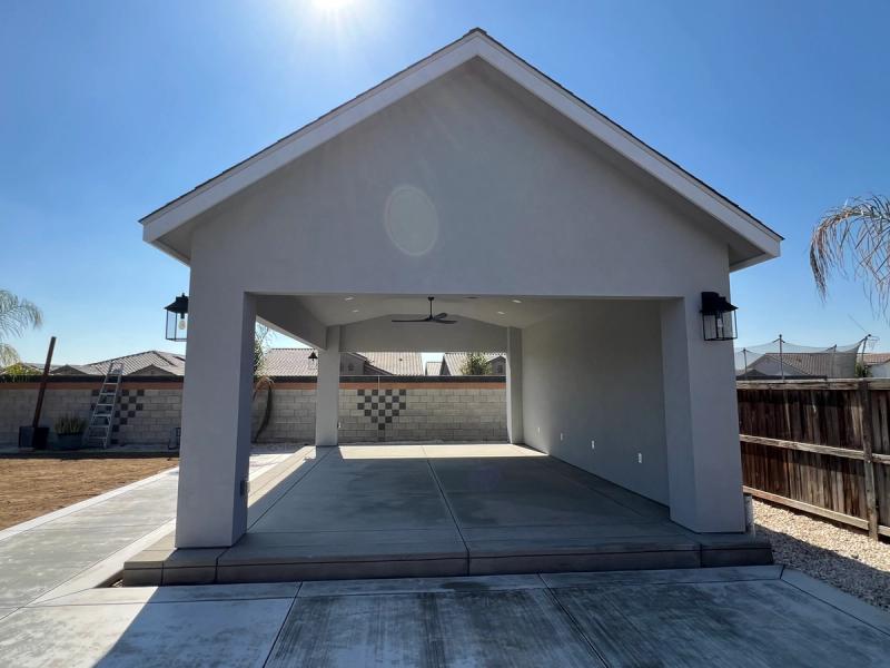 Patio cover with an 8/12 roof pitch.