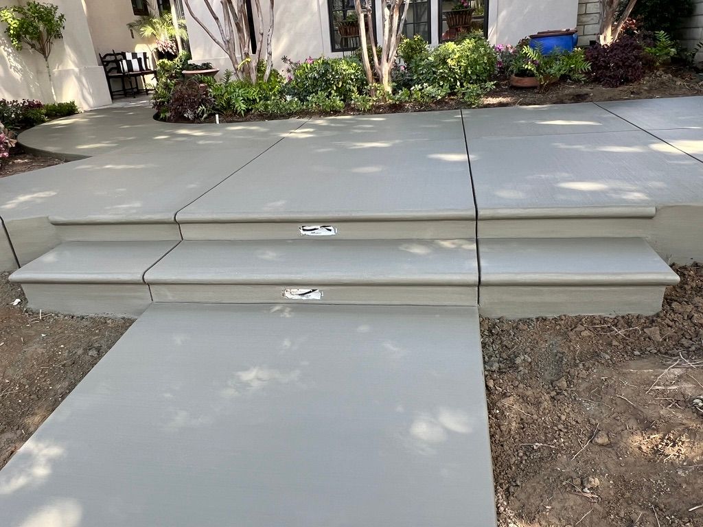 Smooth concrete steps with embedded lighting