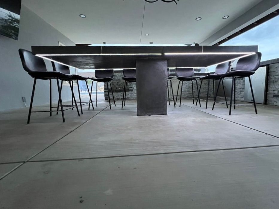 Modern concrete fire pit table with LED under-lighting