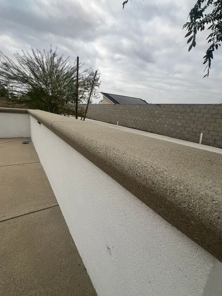 Exposed aggregate retaining wall cap detail