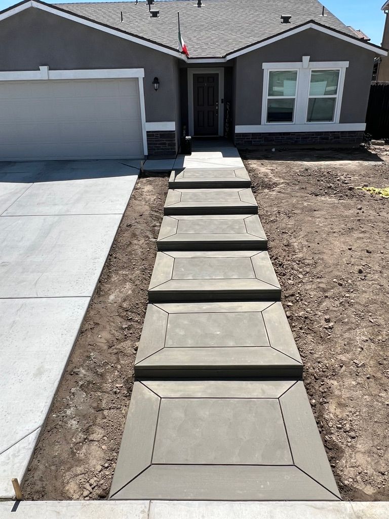 Modern floating concrete steps with decorative border