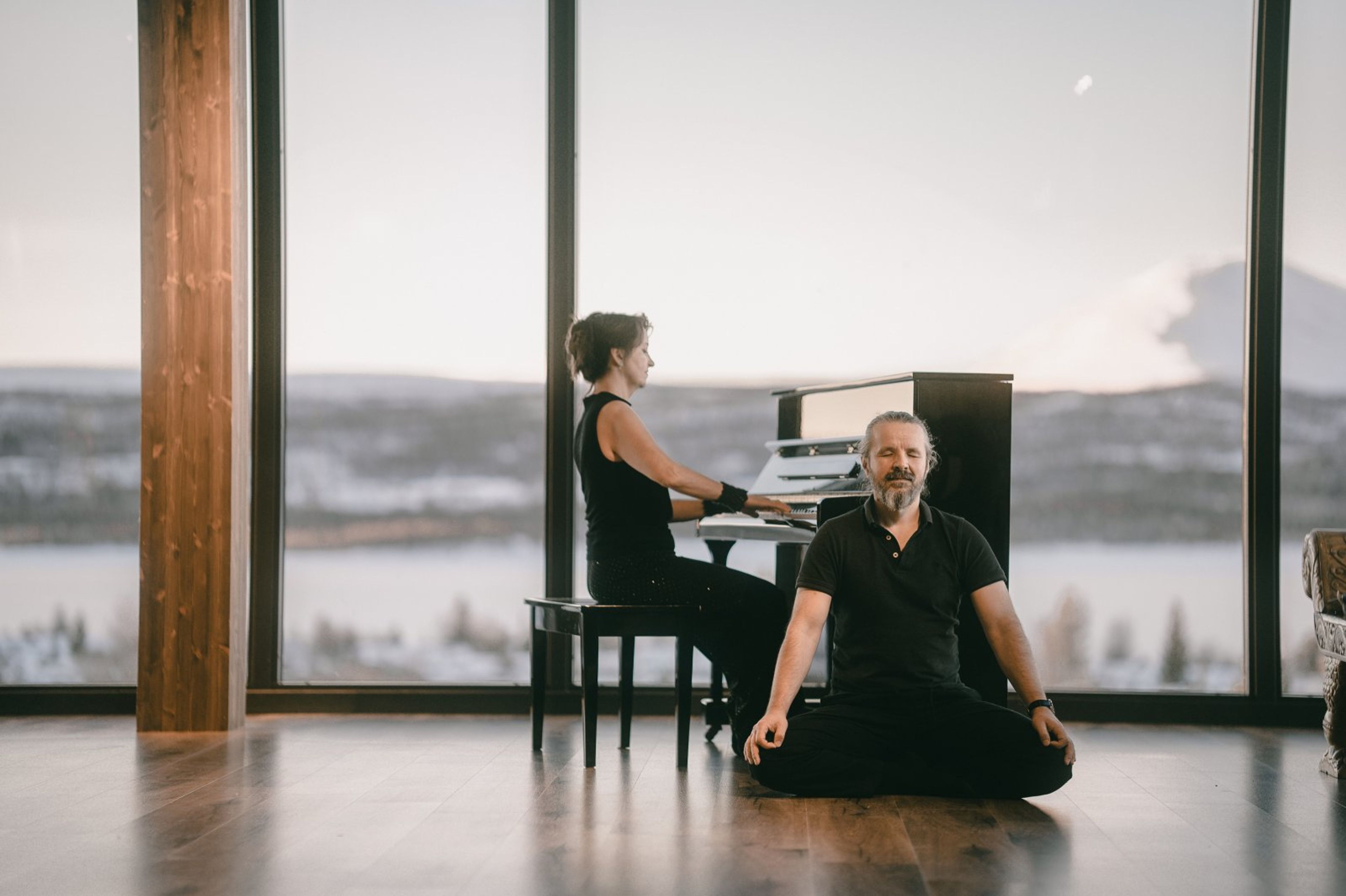 pioano playing woman and listening man