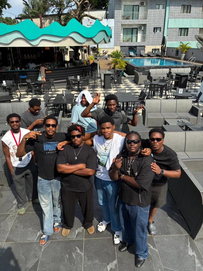 Ebubechukwu in a group photo with PM2AM