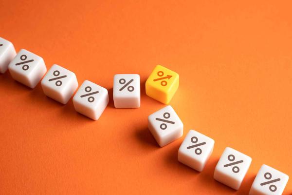 A row of percentage dice with one yellow die breaking out