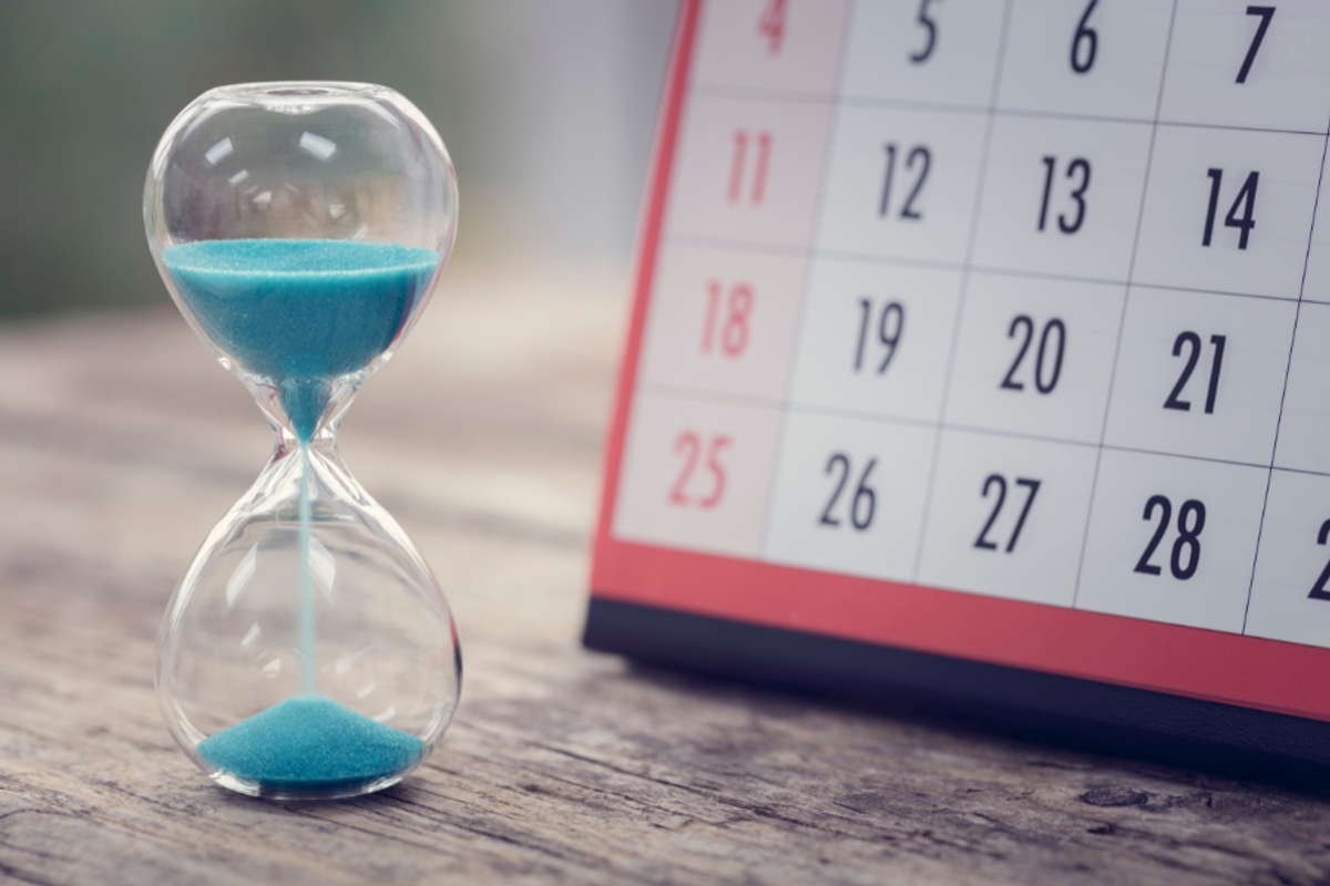 Hour glass and calendar important appointment date