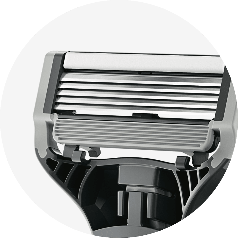 Close-up of a 5- blade razor cartridge on a white background.