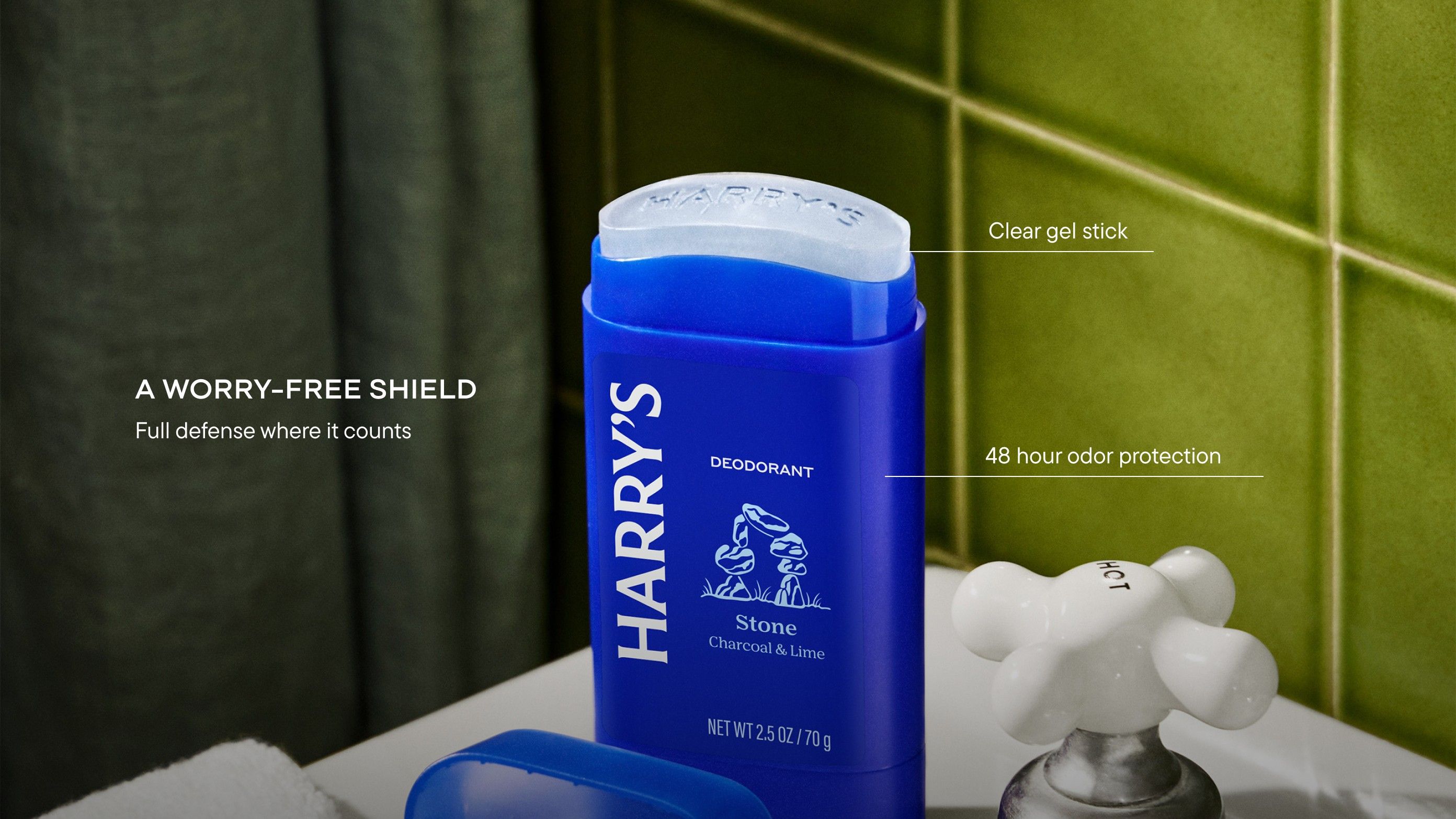 Harry’s deodrant on a bathroom counter with green tiles; on-image text highlights 48-hour odor protection.