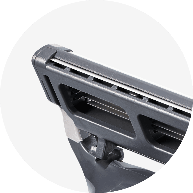 Close-up of a precision blade on back of razor cartridge on a white background.