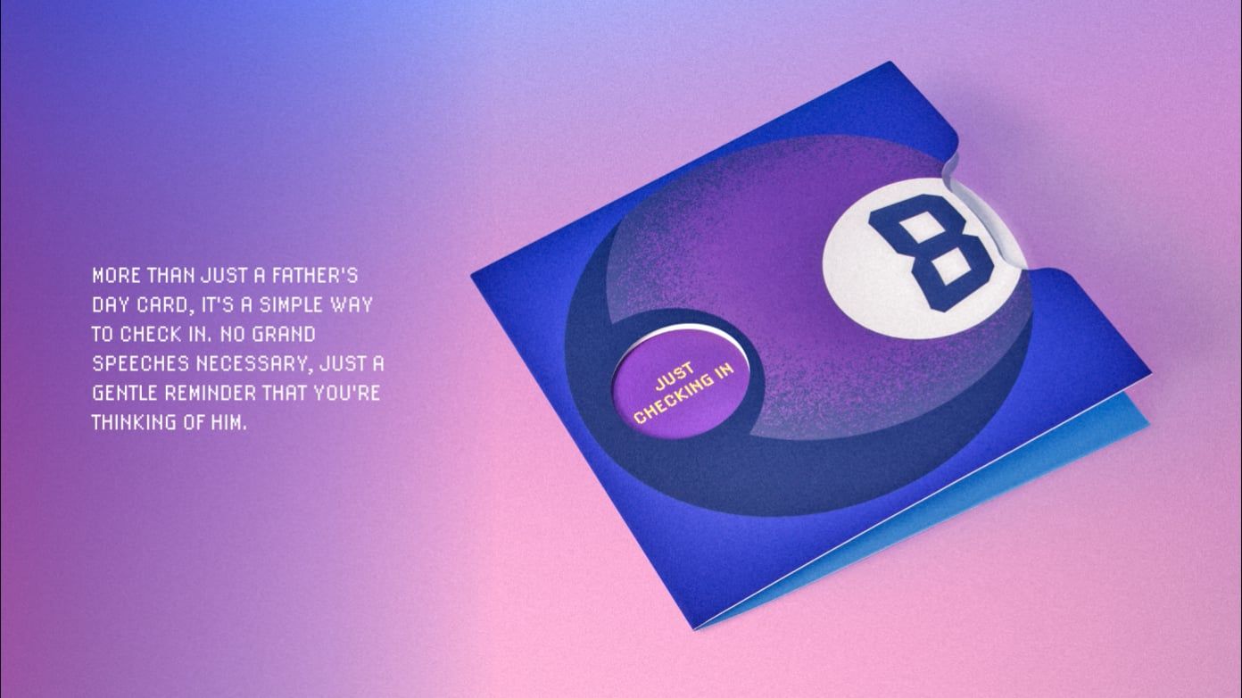 A card with a ball with the number eight on it made for Father's Day set against a pink and blue gradient background