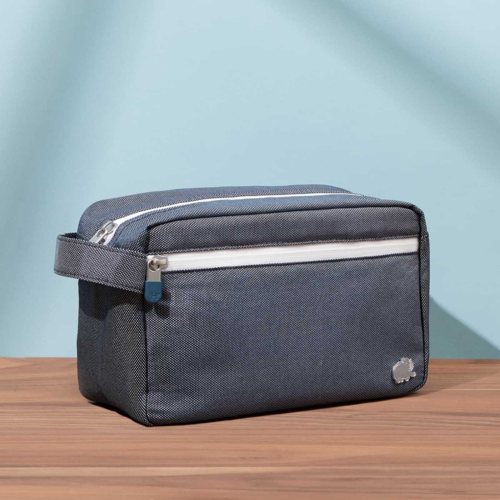Wash back on a wooden ledge with light blue background.
