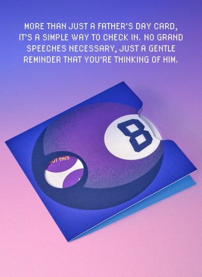 A card with a ball with the number eight on it made for Father's Day set against a pink and blue gradient background