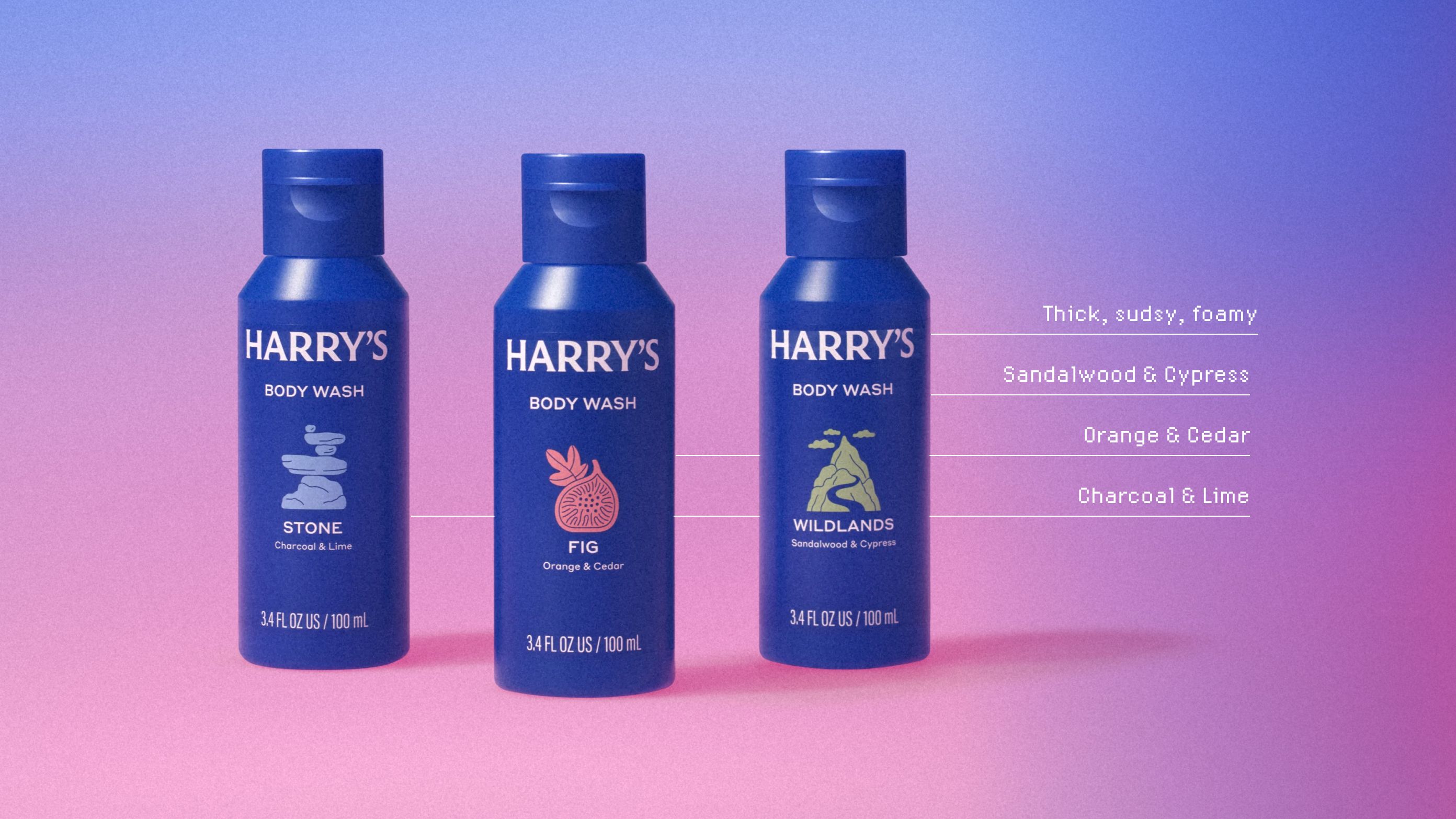Travel sized body washes in multiple scents against a purple and pink gradient