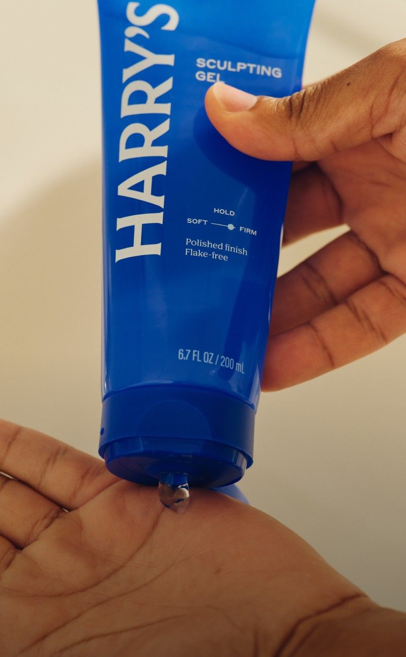 Hand squeezing Sculpting Gel into palm