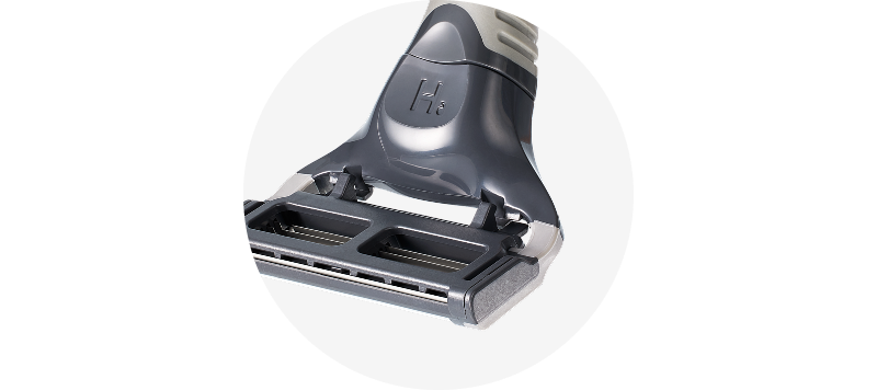 Close-up of flex hinge of razor cartridge on a white background