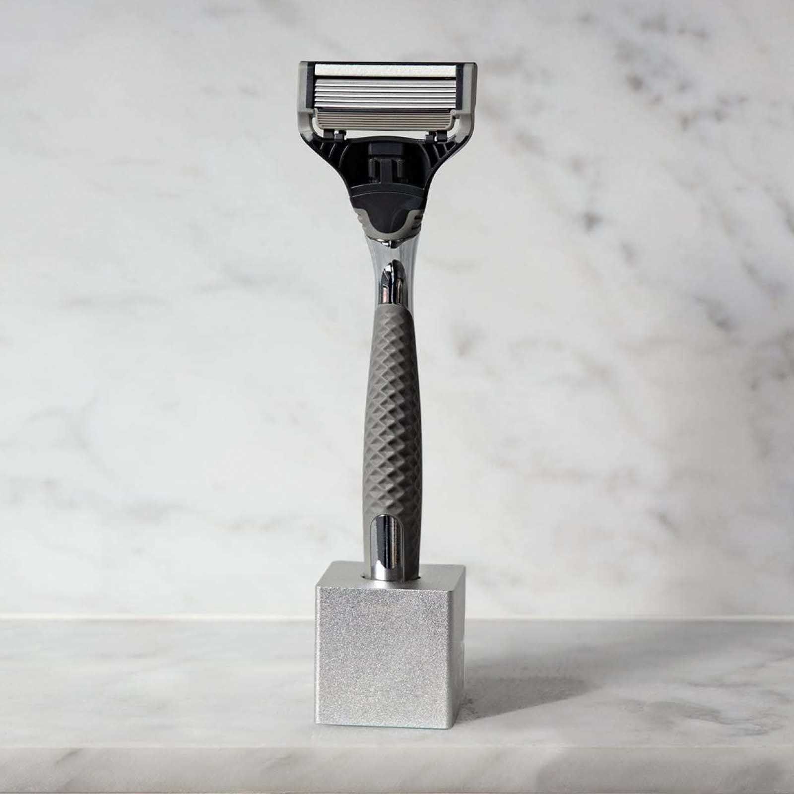 Close up of the Razor Stand holding the Winston razor.