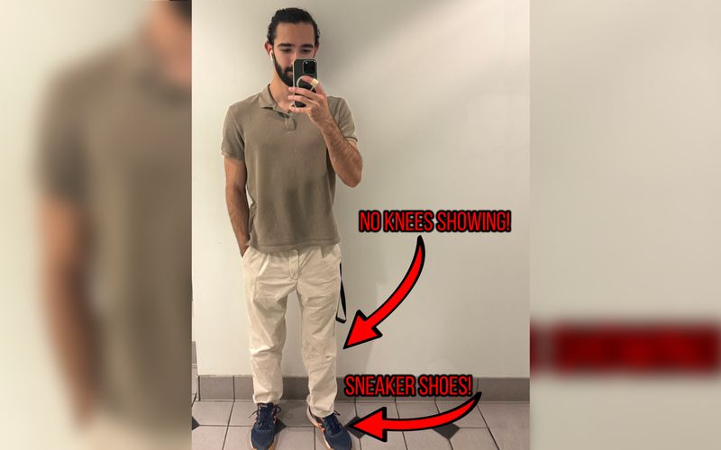 Ryan Majd taking a mirror selfie showing off his outfit, including a polo style top, dress pants that are comfy and do not show knees, and sneaker shoes as Macy's Technology is more casual.