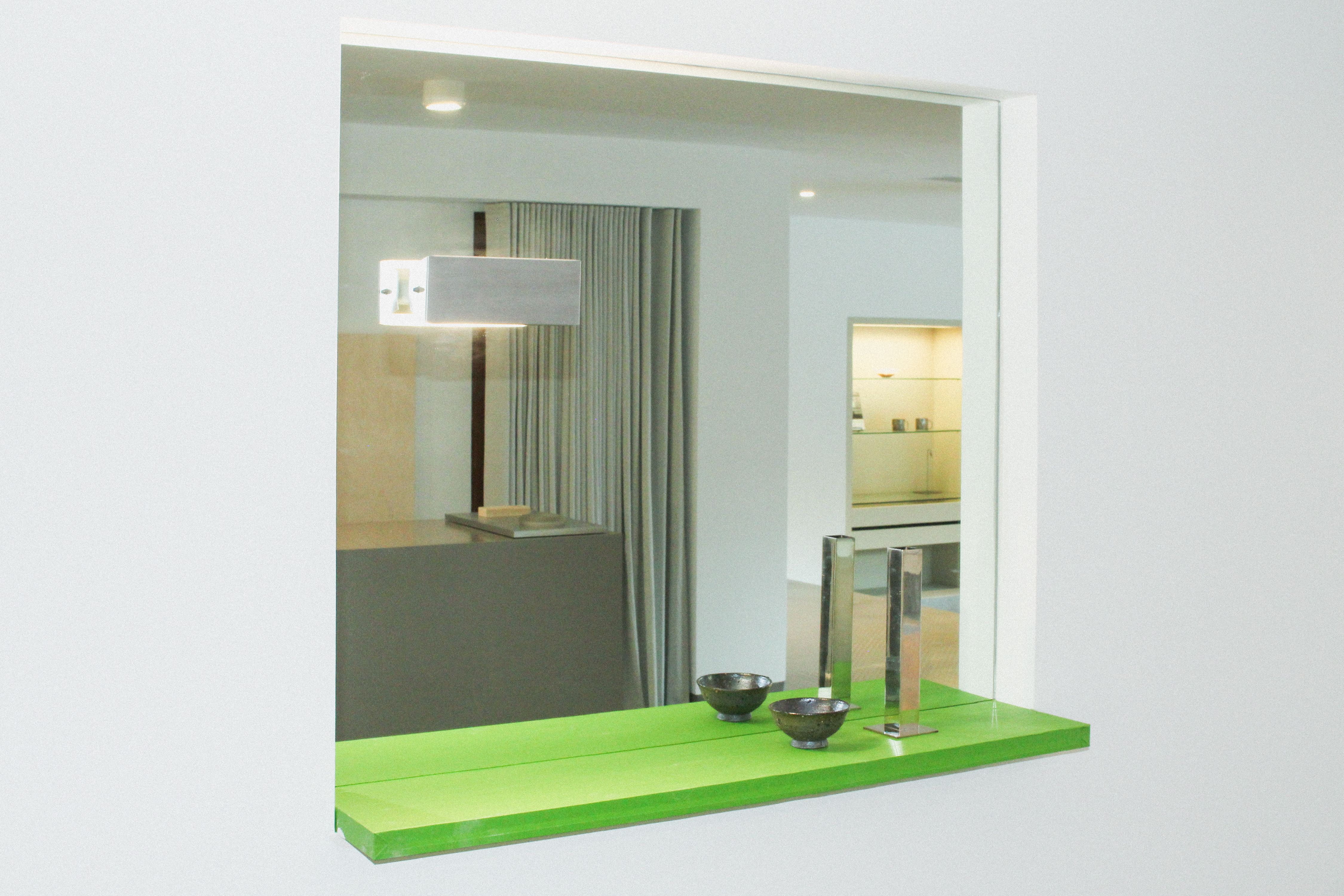 a shelf wrapped in green tape, WOE, Width Over Ears
