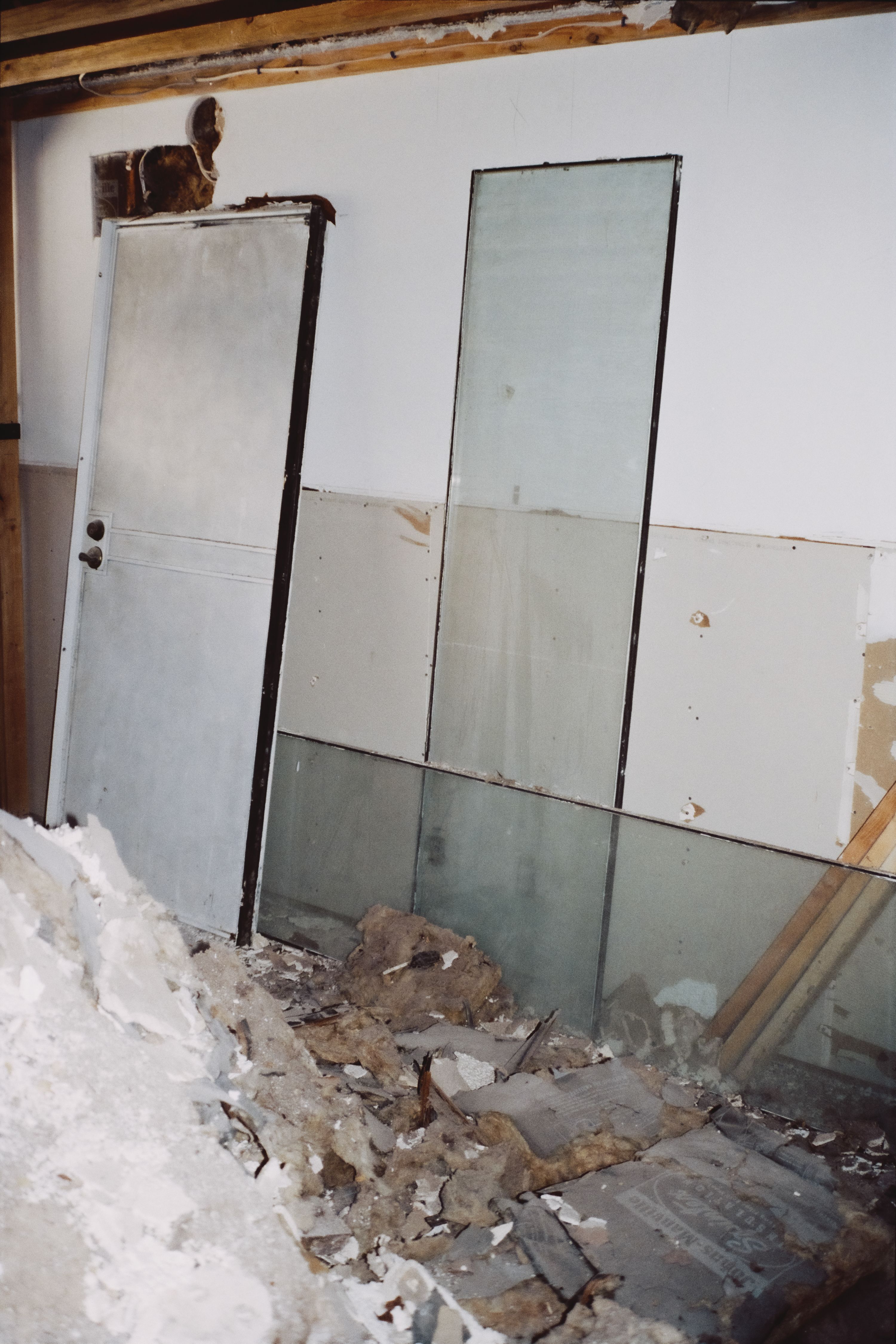 a construction site with debris all around, WOE, Width Over Ears