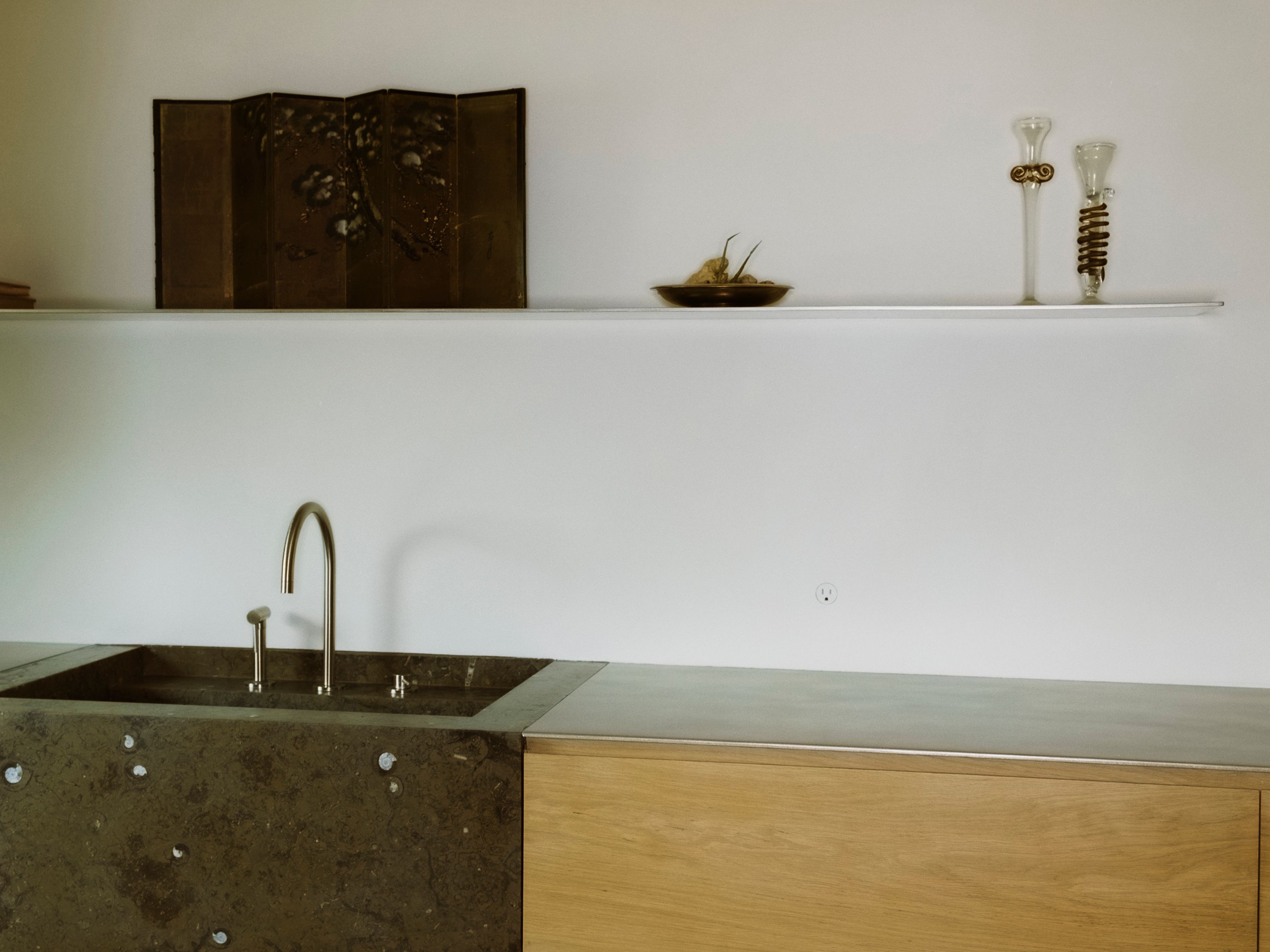 green stone sink with silver faucet, stainless steel shelf, WOE, width over ears