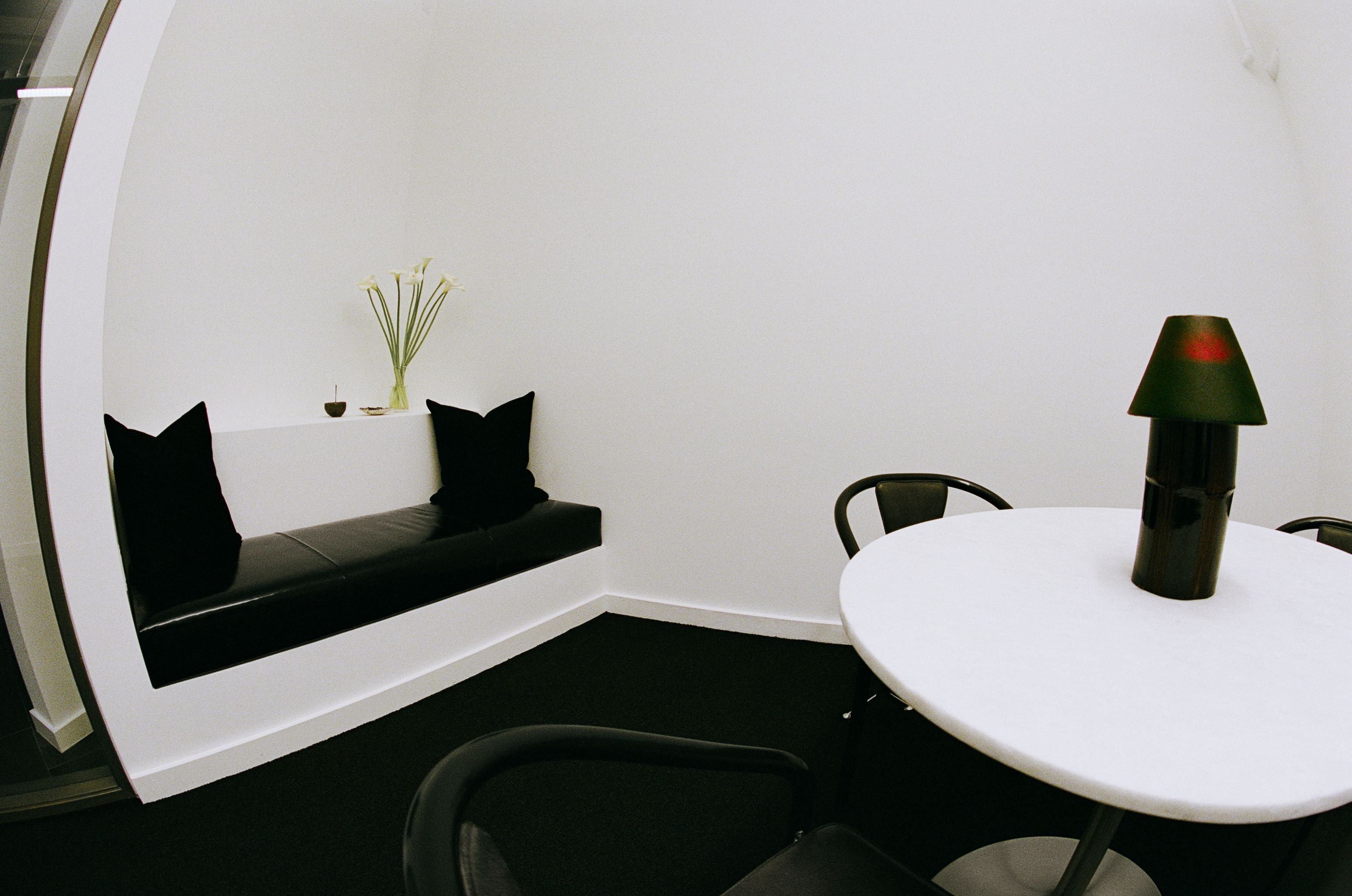 a black and white image of an office work room