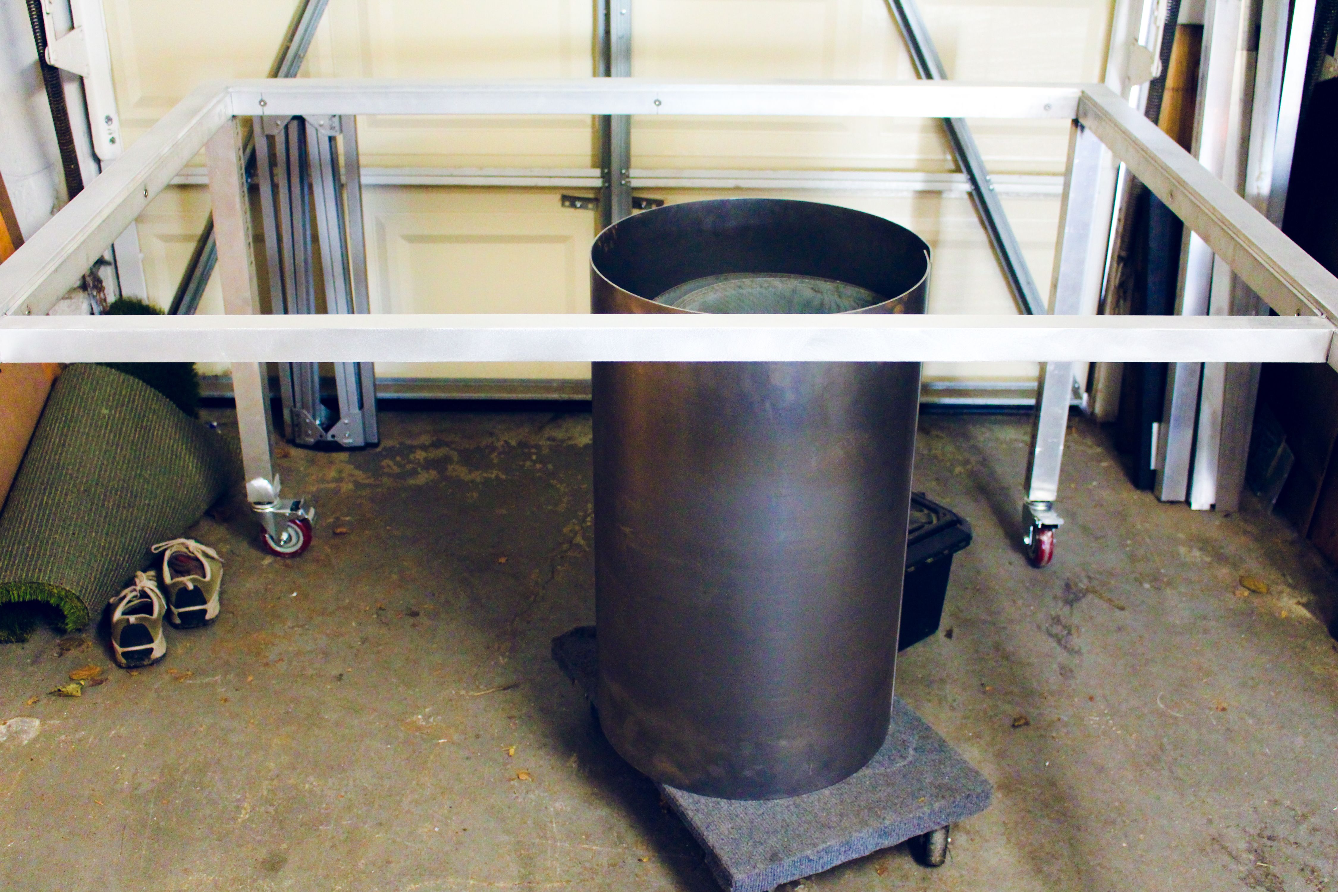 an aluminum frame table, in process, WOE, Width Over Ears