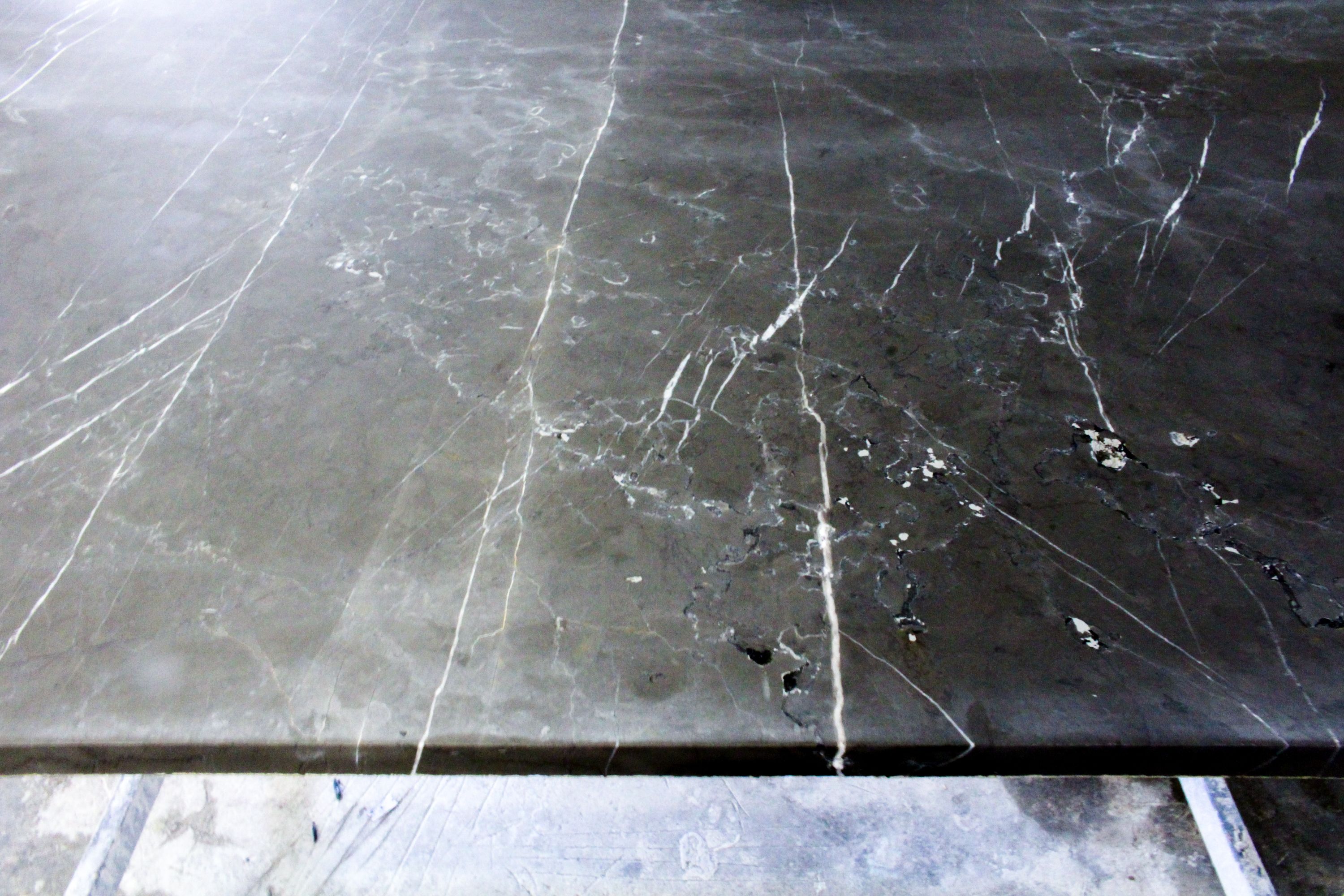 a close up image of grey marble stone