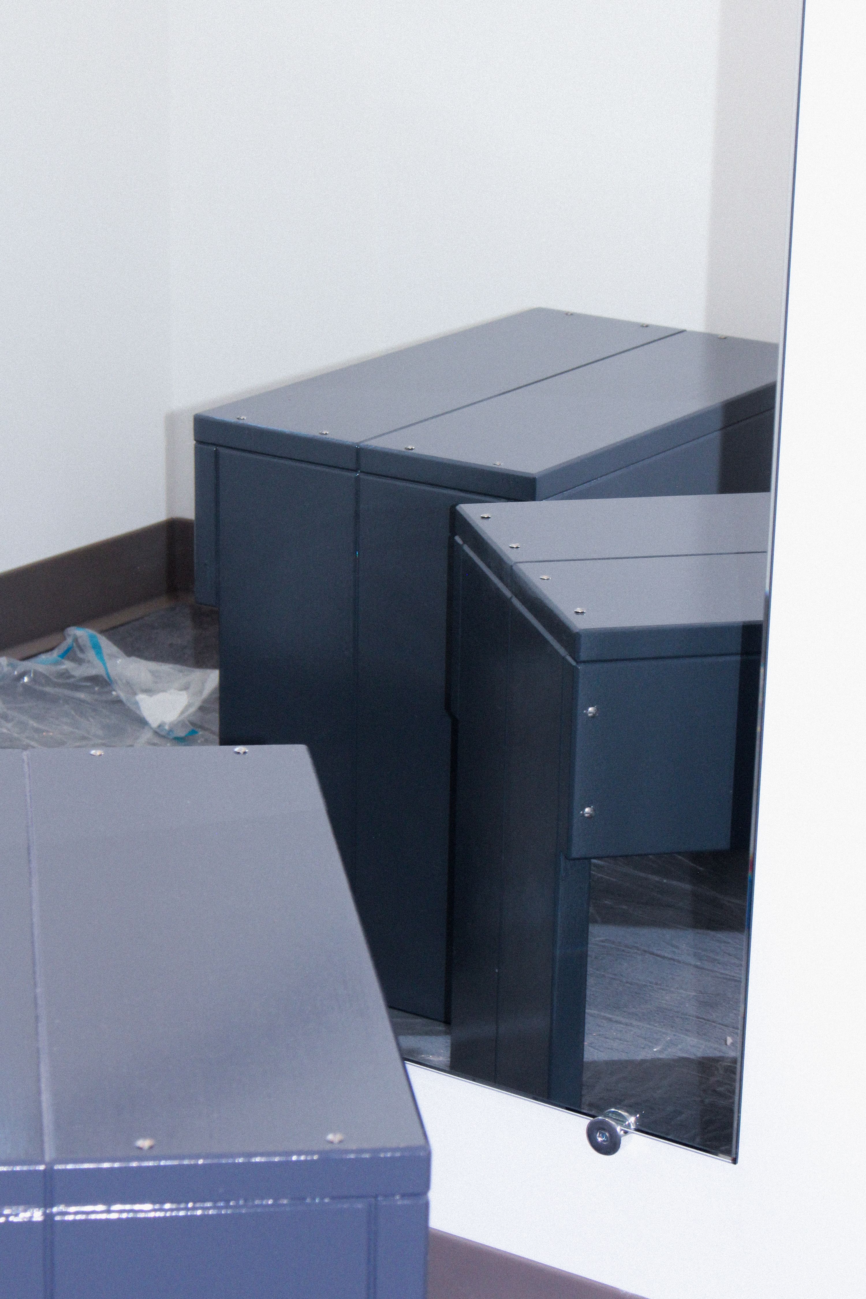 blue painted stools shown in the reflection of a mirror, WOE, Width Over Ears