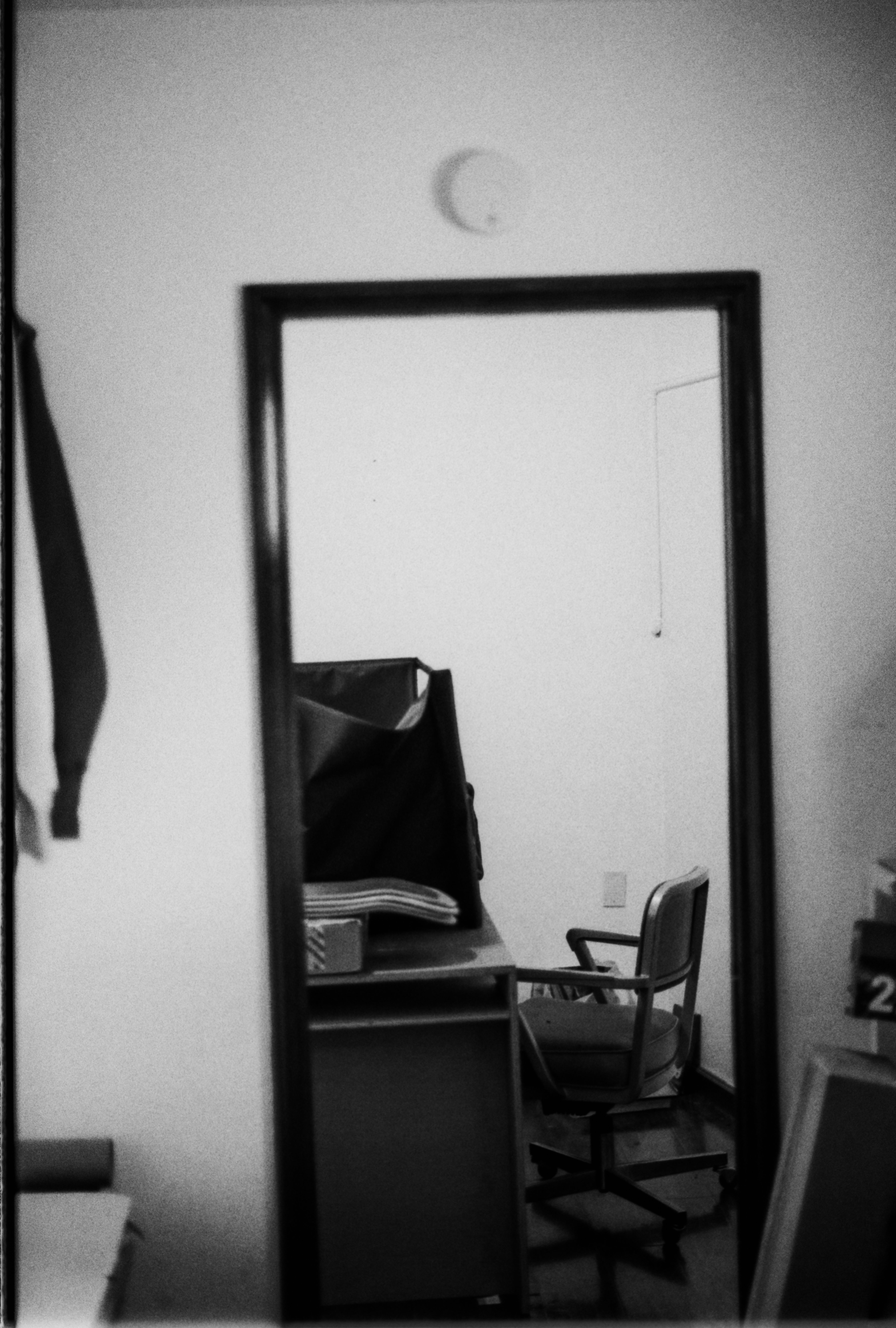 a white room with painted black doorway, WOE, Width Over Ears